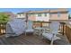 A backyard wooden patio with seating offering a relaxing outdoor space at 815 Regal Sw Ln, Atlanta, GA 30331