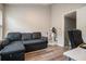 Comfortable living room featuring cozy sofa, open layout and stylish decor at 1137 Liberty Nw Pkwy, Atlanta, GA 30318
