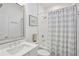 Bright bathroom with a sink and shower/tub combination at 2004 Cortland Rd, Milton, GA 30009