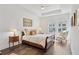 Cozy bedroom featuring hardwood floors and a comfortable, inviting atmosphere at 2004 Cortland Rd, Milton, GA 30009