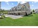 Stylish townhomes boast private garages and balconies, set on a well-maintained lawn at 2004 Cortland Rd, Milton, GA 30009