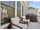 Outdoor patio area with comfortable seating and a grill, perfect for relaxing and entertaining at 2004 Cortland Rd, Milton, GA 30009