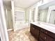 Bathroom featuring a soaking tub and a separate shower at 2101 Adams Acres Dr, Lawrenceville, GA 30043