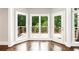 Cozy sunroom with large windows and door to outdoor deck at 226 Crescent Moon Way, Canton, GA 30114