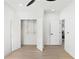 Bright bedroom featuring a spacious closet with organized shelving and neutral decor at 907 Oakhill Sw Ave, Atlanta, GA 30310