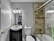 Bathroom features tiled shower, vanity with sink, and ample natural light at 1119 Riverbend Club Se Dr, Atlanta, GA 30339