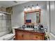 Bathroom features tiled shower, vanity with granite countertop, and ample space at 1119 Riverbend Club Se Dr, Atlanta, GA 30339