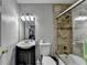 Bathroom features tiled shower, vanity with sink, and ample natural light at 1119 Riverbend Club Se Dr, Atlanta, GA 30339