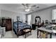 Bedroom boasts a comfortable bed, desk, and a ceiling fan, creating a peaceful ambiance at 1119 Riverbend Club Se Dr, Atlanta, GA 30339