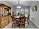 The dining room is furnished with wooden table and chairs, plus a built-in hutch at 1119 Riverbend Club Se Dr, Atlanta, GA 30339