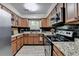 Kitchen features stainless steel appliances, granite counters, and tile backsplash at 1119 Riverbend Club Se Dr, Atlanta, GA 30339