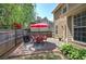 Backyard featuring a patio with dining furniture, a grill, and a well-kept lawn at 2186 Mainsail Dr, Marietta, GA 30062