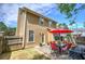 Backyard with patio, outdoor dining furniture, and well-maintained lawn at 2186 Mainsail Dr, Marietta, GA 30062