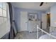 Bedroom with gray carpet, soft blue walls, and a neutral-toned dresser and mirror at 2186 Mainsail Dr, Marietta, GA 30062