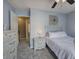 Comfortable bedroom with a light blue wall and carpeted floors at 2186 Mainsail Dr, Marietta, GA 30062