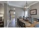 Cozy dining area with a view into the kitchen, perfect for casual meals and entertaining guests at 2186 Mainsail Dr, Marietta, GA 30062