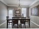 Inviting dining room with a decorative chandelier and ample seating for Gathering gatherings at 2186 Mainsail Dr, Marietta, GA 30062