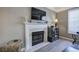 Close-up of the elegant fireplace with a decorative mantel and hearth, perfect for cozy evenings at 2186 Mainsail Dr, Marietta, GA 30062