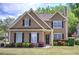 Charming two-story home with well-manicured lawn and mature landscaping at 2186 Mainsail Dr, Marietta, GA 30062