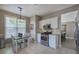 Bright eat-in kitchen boasts stainless steel appliances and ample cabinet space at 2186 Mainsail Dr, Marietta, GA 30062