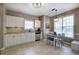 Well-lit kitchen features stainless steel appliances, granite countertops, and neutral decor at 2186 Mainsail Dr, Marietta, GA 30062