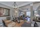 Bright living room with a fireplace, ceiling fan, and decorative accents, creating a welcoming atmosphere at 2186 Mainsail Dr, Marietta, GA 30062