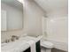 Bathroom featuring a marble vanity, gold faucet, and shower-tub combo at 22 Haygood Se Ave, Atlanta, GA 30315