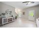 Modern entryway features a decorative cabinet and a staircase with iron railings at 22 Haygood Se Ave, Atlanta, GA 30315