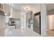 Bright, modern kitchen featuring stainless steel appliances and white cabinetry at 22 Haygood Se Ave, Atlanta, GA 30315