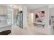 Bright kitchen features stainless appliances and a vivid, colorful art piece at 22 Haygood Se Ave, Atlanta, GA 30315