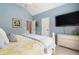 Bedroom featuring light blue walls, and a flat screen TV mounted to the wall at 416 Battlefield Creek Dr, Marietta, GA 30064
