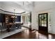 Elegant dining room with wainscoting, dark blue walls, and hardwood floors at 416 Battlefield Creek Dr, Marietta, GA 30064