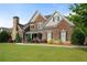 Charming brick home with manicured lawn, trimmed bushes and attractive exterior at 416 Battlefield Creek Dr, Marietta, GA 30064