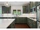 This home has a modern kitchen with shaker cabinets, granite countertops, and stainless appliances at 416 Battlefield Creek Dr, Marietta, GA 30064