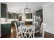 Eat-in kitchen featuring a center island, stainless steel refrigerator, and modern decor at 416 Battlefield Creek Dr, Marietta, GA 30064
