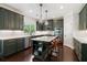 Well-lit kitchen features shaker cabinets, stainless appliances, and a center island with seating at 416 Battlefield Creek Dr, Marietta, GA 30064