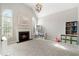 Bright living room with fireplace, vaulted ceiling, and light-filled windows at 416 Battlefield Creek Dr, Marietta, GA 30064