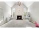 Bright living room with fireplace, vaulted ceiling, and light-filled windows at 416 Battlefield Creek Dr, Marietta, GA 30064