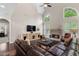 Charming living room with tall windows, a stone fireplace, and a cozy seating area at 416 Battlefield Creek Dr, Marietta, GA 30064