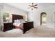Bright main bedroom featuring dark wood furniture, light walls, and carpet floors at 416 Battlefield Creek Dr, Marietta, GA 30064