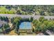 Aerial view of well-maintained tennis courts surrounded by lush greenery, offering a great amenity at 416 Battlefield Creek Dr, Marietta, GA 30064
