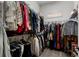 Organized walk-in closet with clothing racks and shelving at 416 Battlefield Creek Dr, Marietta, GA 30064