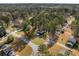 Aerial view of the home nestled among mature trees in a peaceful neighborhood at 4347 Pleasant Ridge Rd, Decatur, GA 30034