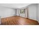 Bright bedroom featuring hardwood floors, a large window and neutral color at 4347 Pleasant Ridge Rd, Decatur, GA 30034