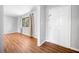 Light-filled entry way featuring a hardwood floor, window and entry door at 4347 Pleasant Ridge Rd, Decatur, GA 30034