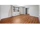 Bright living room featuring wood flooring, a large window, and neutral paint at 4347 Pleasant Ridge Rd, Decatur, GA 30034