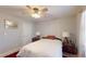 This bedroom features bright walls, lighting, and a cozy rug at 679 Suwanee Ct, Lawrenceville, GA 30043