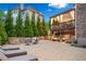 Outdoor living space with a fire pit, lounge seating, and pergola-covered deck for relaxation at 903 Shaftoe Nw St, Kennesaw, GA 30152