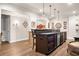 Finished basement with a custom bar area and granite countertops at 903 Shaftoe Nw St, Kennesaw, GA 30152