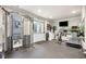 Home gym featuring a variety of equipment, mirrored walls, and ample space for a comprehensive workout routine at 903 Shaftoe Nw St, Kennesaw, GA 30152